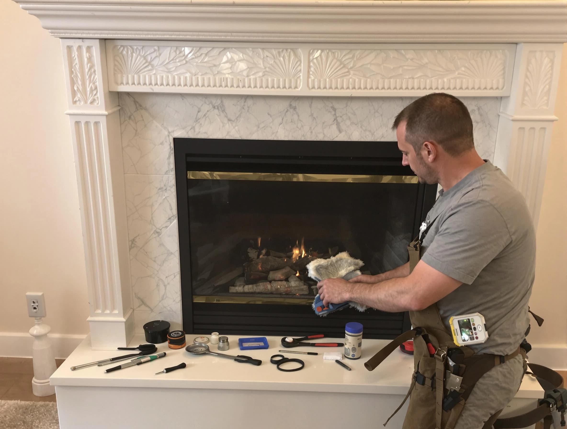 Millburn Chimney Sweep performing fireplace maintenance in Millburn, NJ